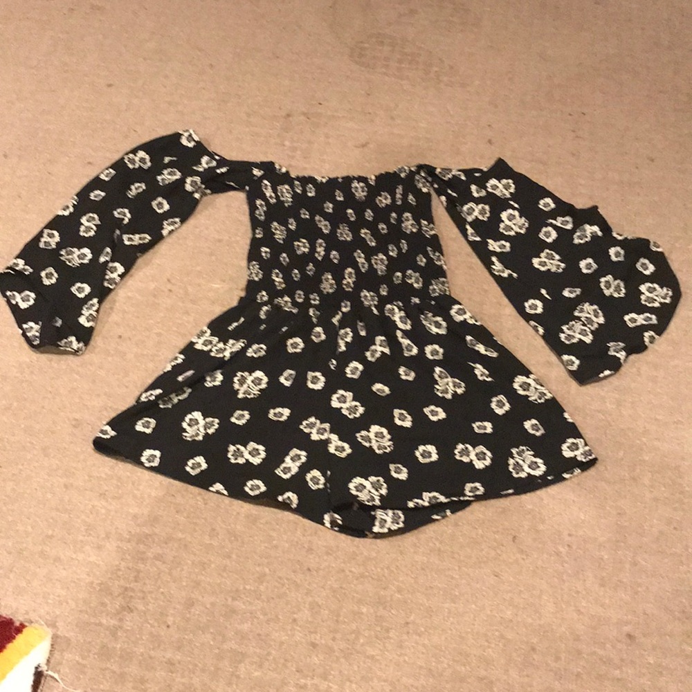 Floral romper tight at the top with loose sleeves